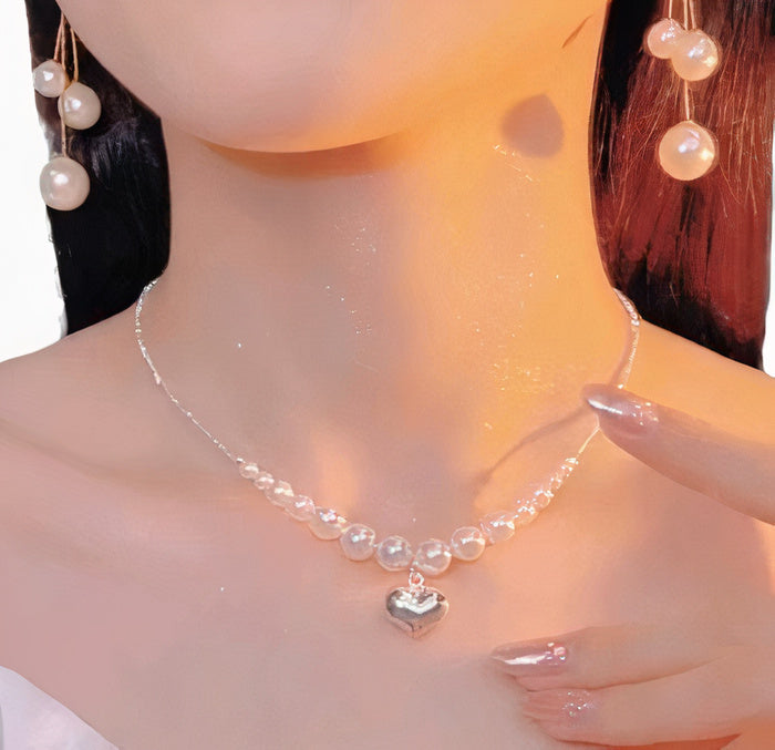 Collier élégant perles et cœur doré