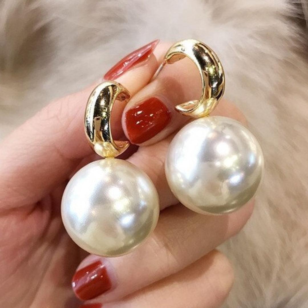 Grandes boucles d'oreilles en perles dorées