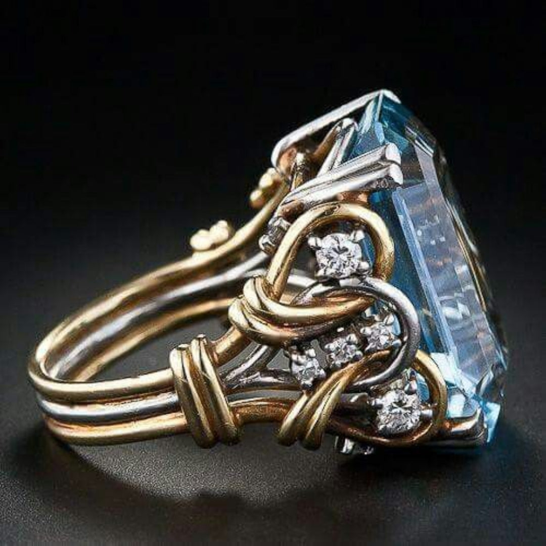 Bague dorée vintage superposée zircon bleu