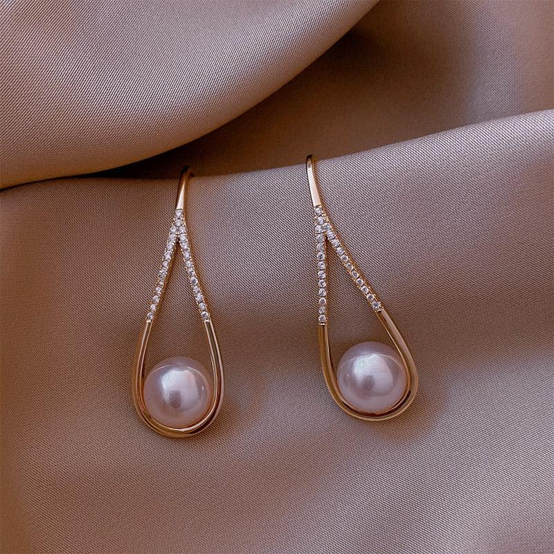 Boucles d'oreilles perle or rose