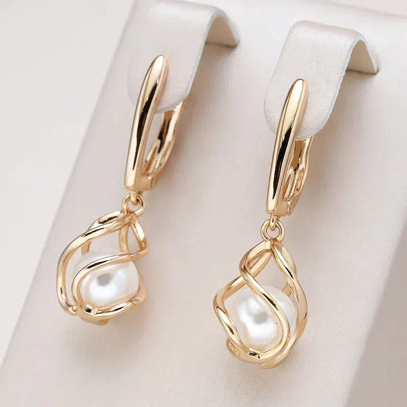 Élégantes boucles d'oreilles perle en or