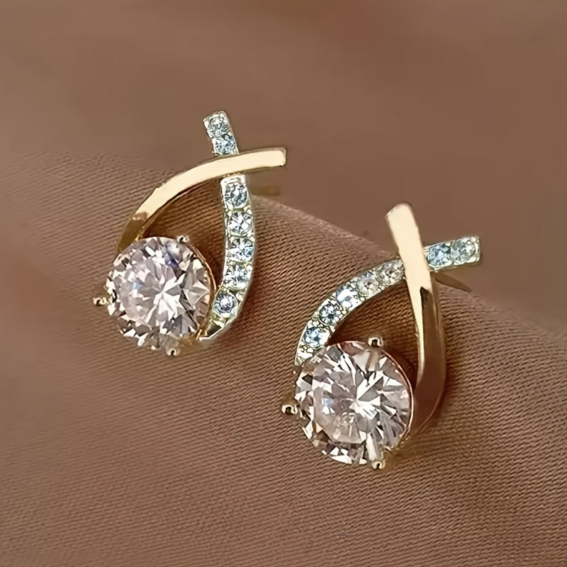 Boucles d'oreilles clous Golden Cross avec zircone