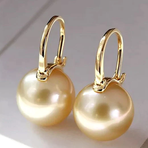 Élégantes boucles d'oreilles en perles dorées