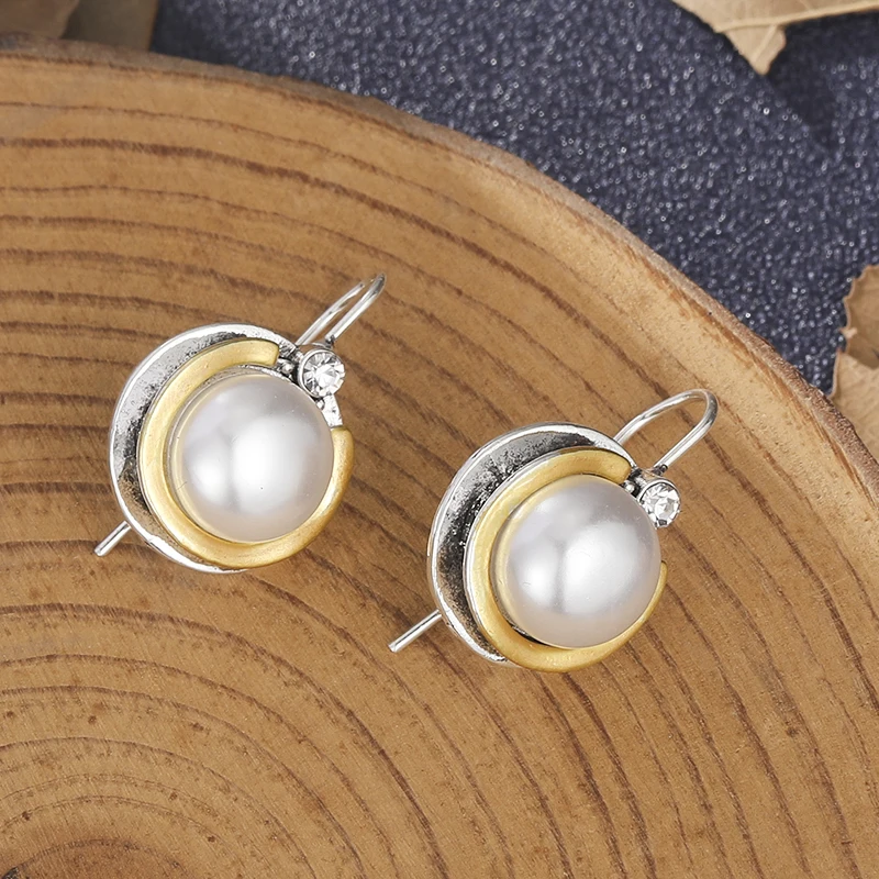 Boucles d'oreilles élégantes incrustées de perles