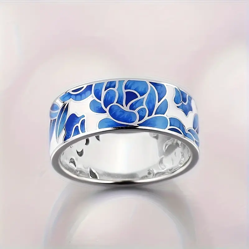 Bague vintage en argent et émail bleu en forme de fleur