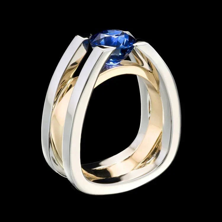 Bague vintage en or et argent avec zircone bleue
