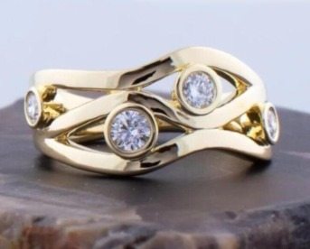 Bague spirale vintage en or incrustée de zircone