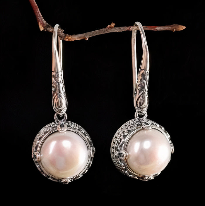Boucles d'oreilles vintage en argent incrusté de perles