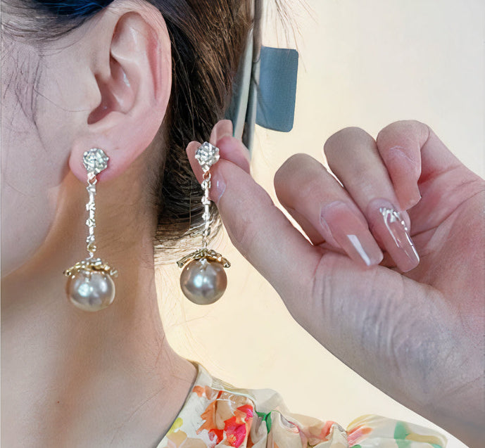 Boucles d'oreilles pendantes intemporelles en perles