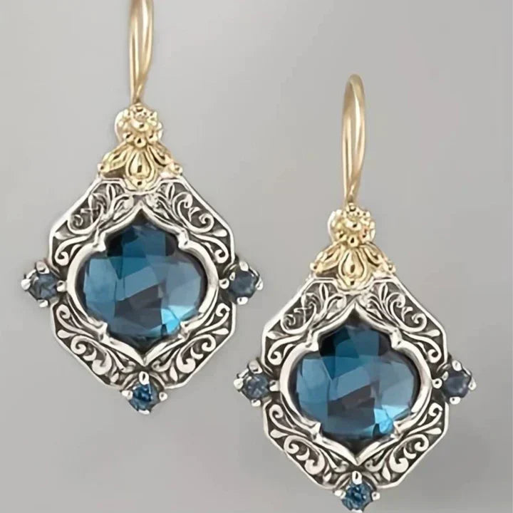 Boucles d'oreilles vintage or et cristal bleu