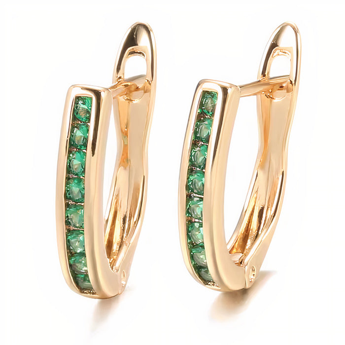 Boucles d'oreilles en or, émeraudes et diamants