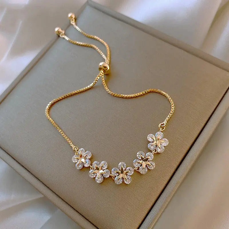 Bracelet marguerite en cristal doré