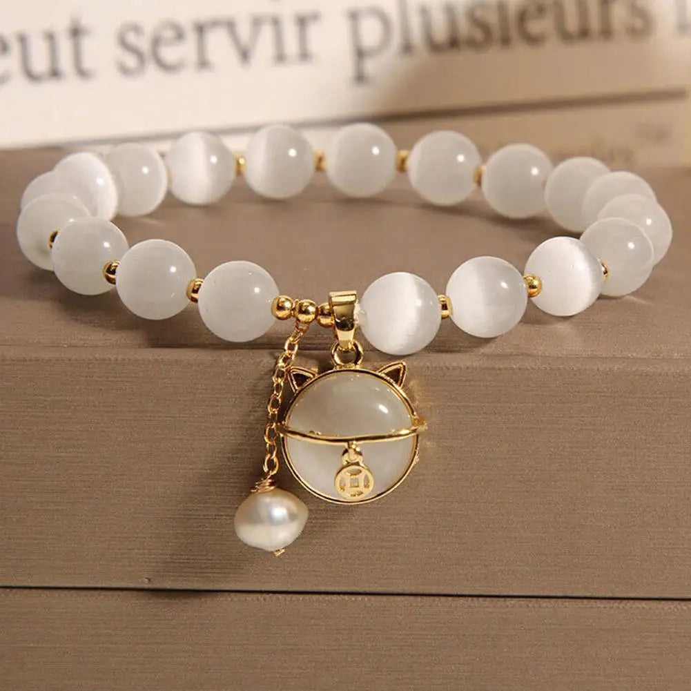 Bracelet de perles avec pendentif chat porte-bonheur