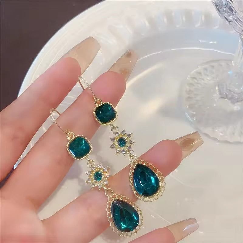 Boucles d'oreilles pendantes en verre vintage