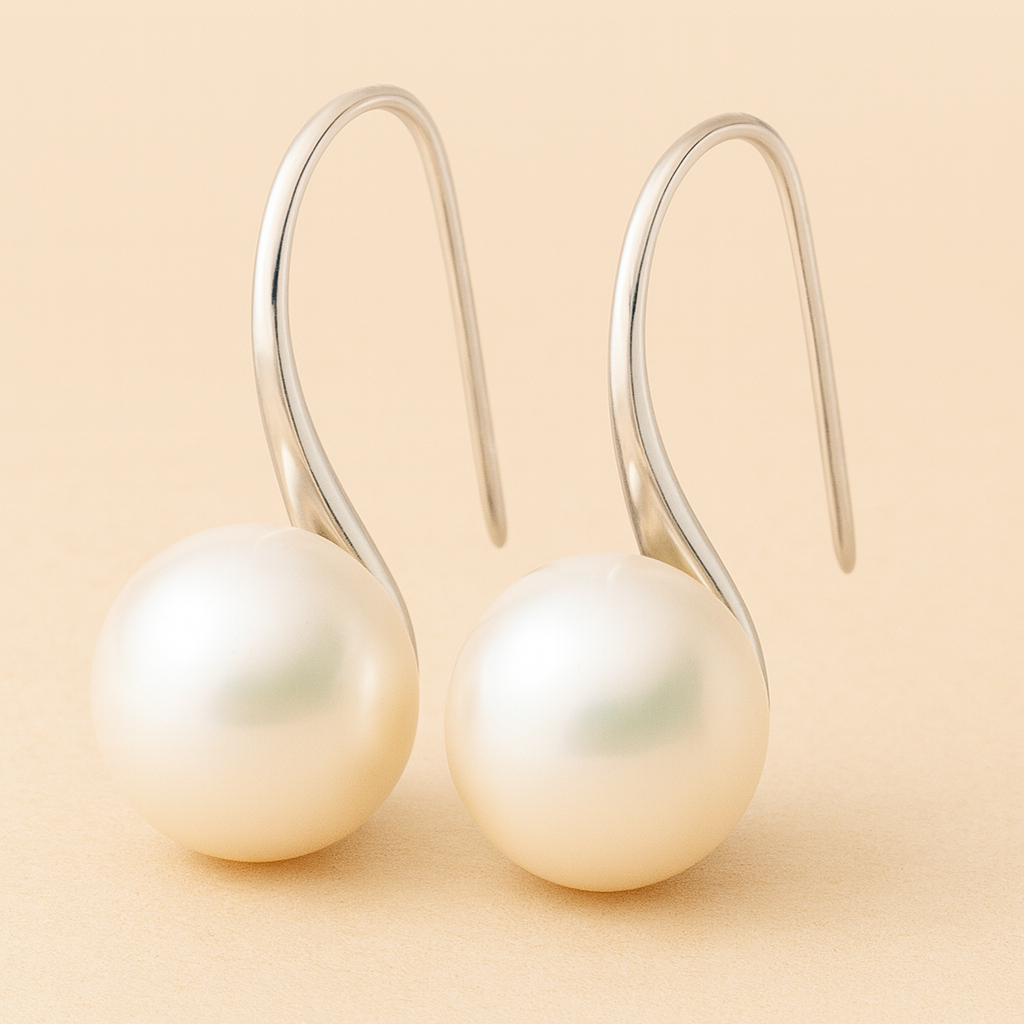 Boucles d'oreilles pendantes élégantes avec perles