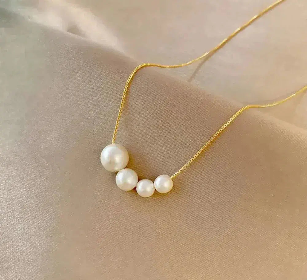 Élégant collier en or avec perles d'eau douce