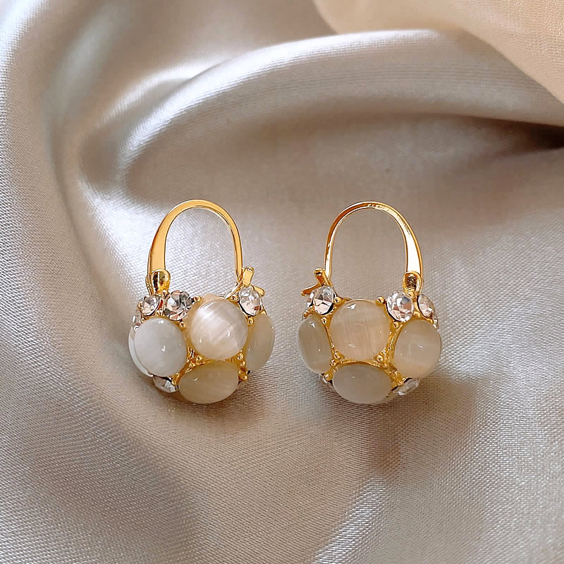Boucles d'oreilles en perles avec cristaux dorés