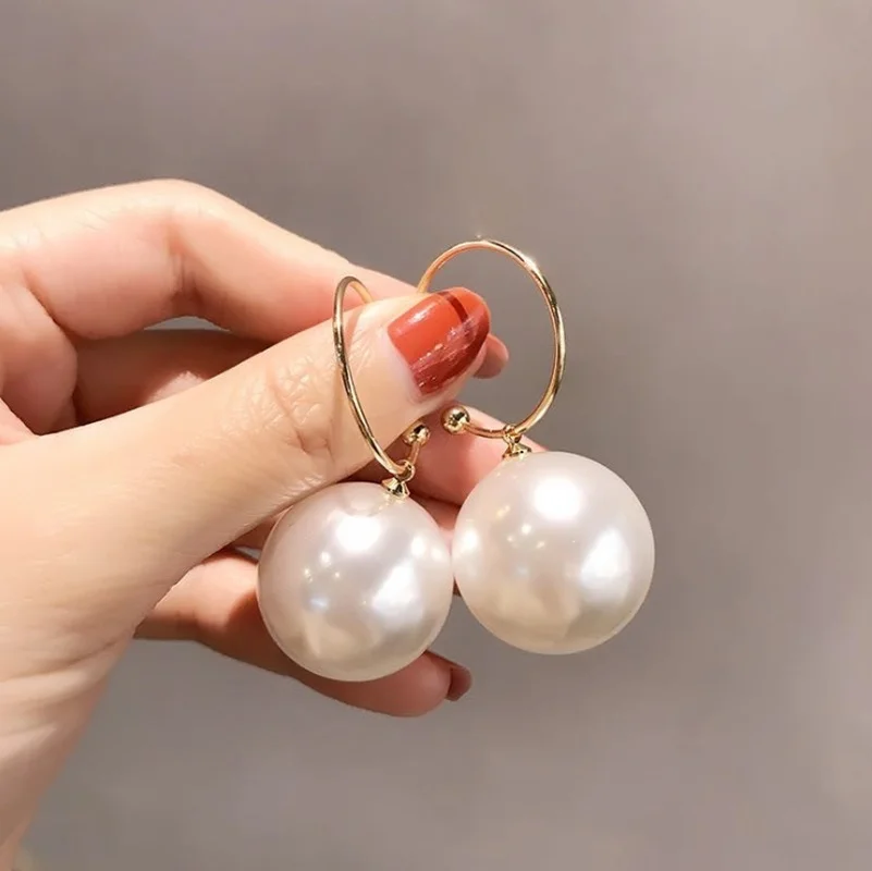 Grandes boucles d'oreilles élégantes en perles