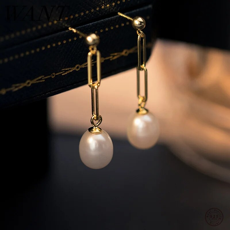 Boucles d'oreilles pendantes vintage en perles