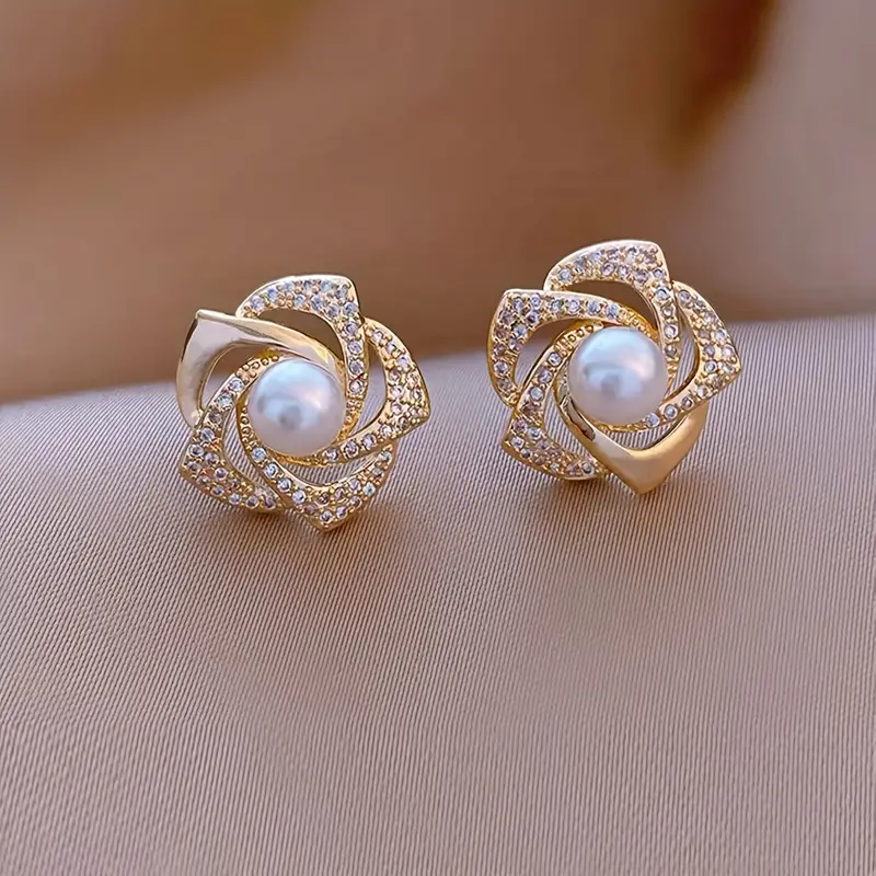 Élégantes boucles d'oreilles spirales légères en perles