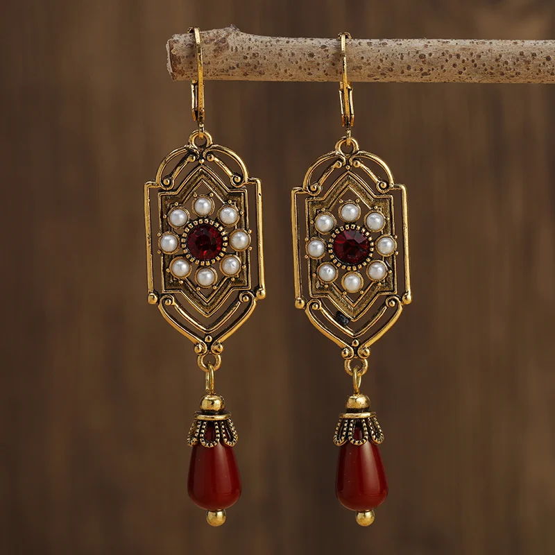 Boucles d'oreilles vintage rouges en cristal perle dorée