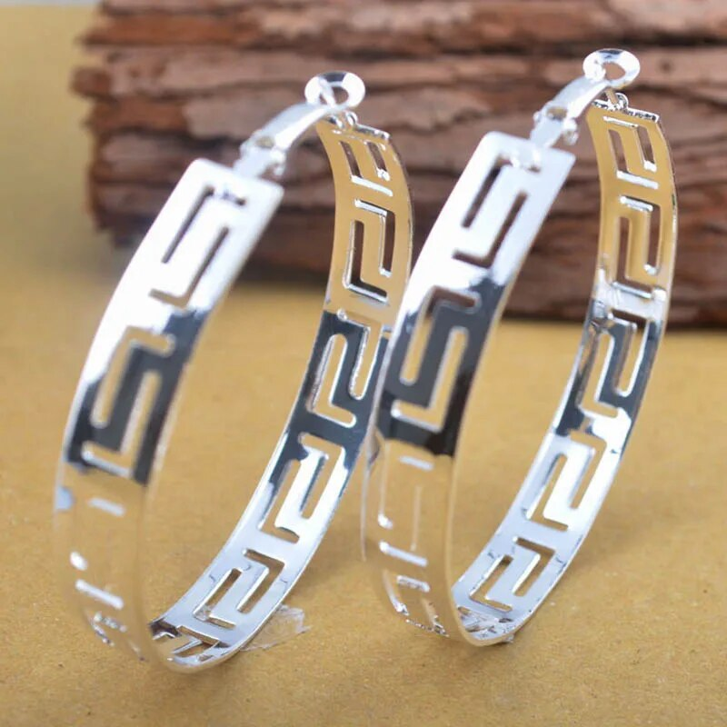 Boucles d'oreilles créoles creuses en argent vintage