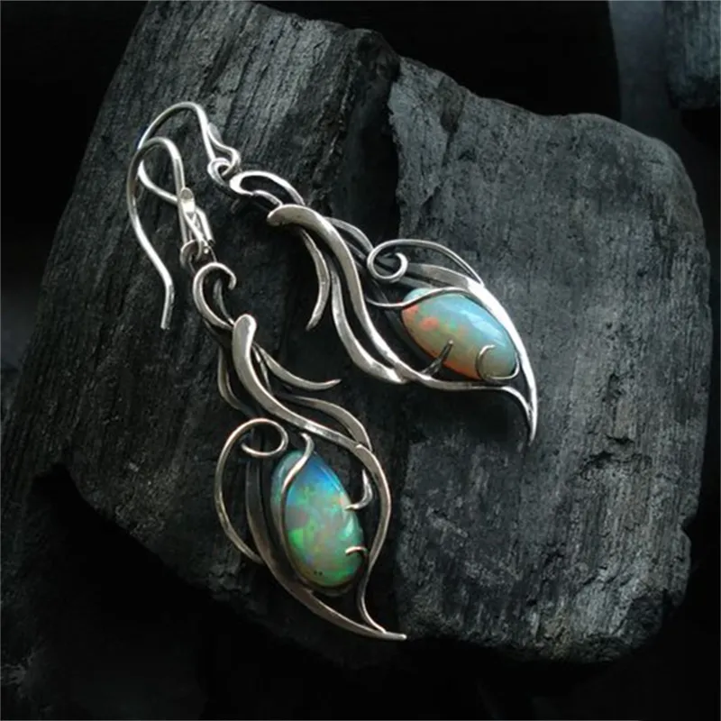 Boucles d'oreilles vintage en argent et opale bleue