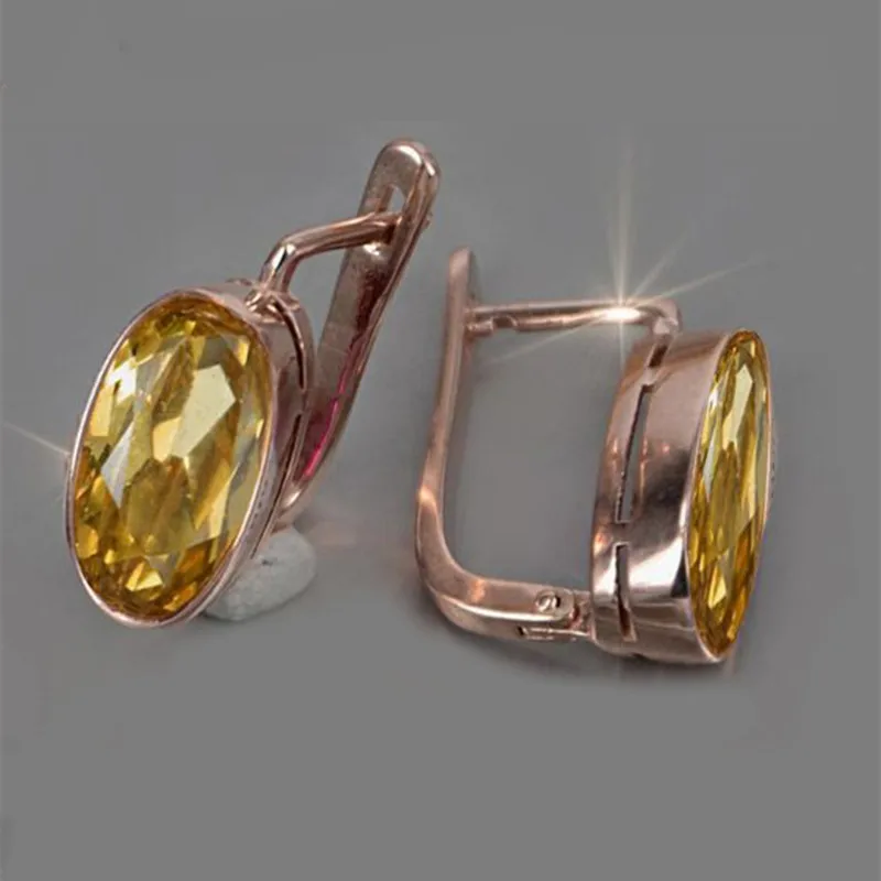 Boucles d'oreilles vintage incrustées de cristal jaune