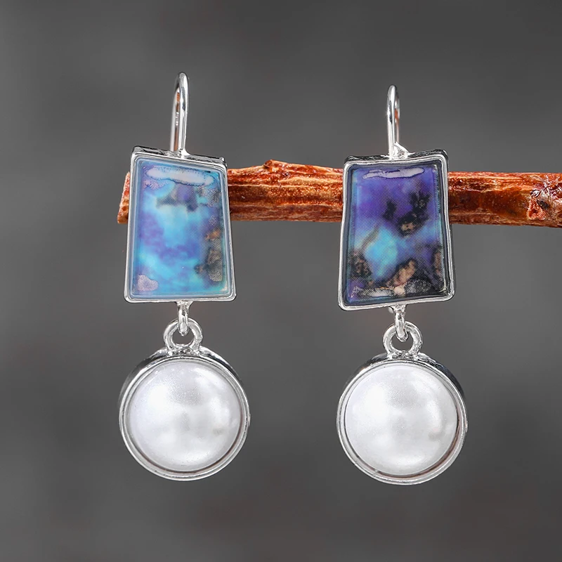 Boucles d'oreilles vintage perle et pierre bleue