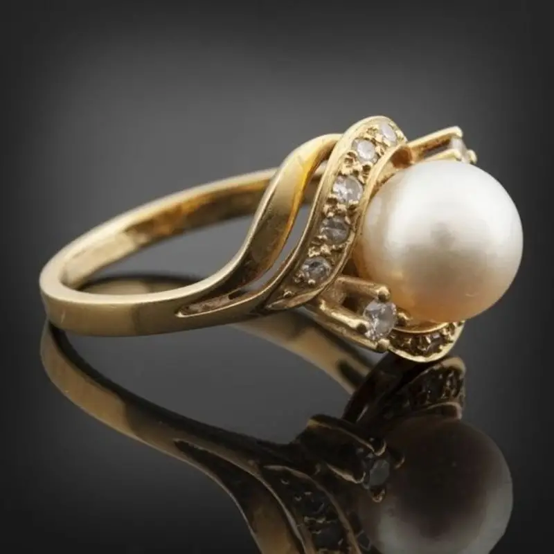 Bague Chic Avec Perle Et Or Radieux