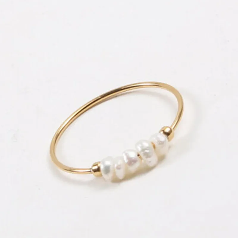 Bague vintage en or avec perle baroque